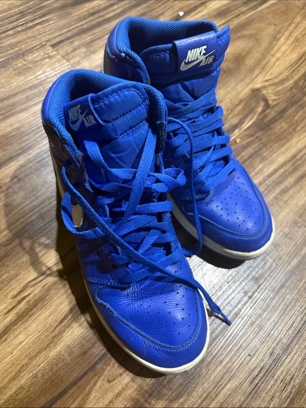 Nike High-Top Sneakers in Bright Blue with White Swoosh